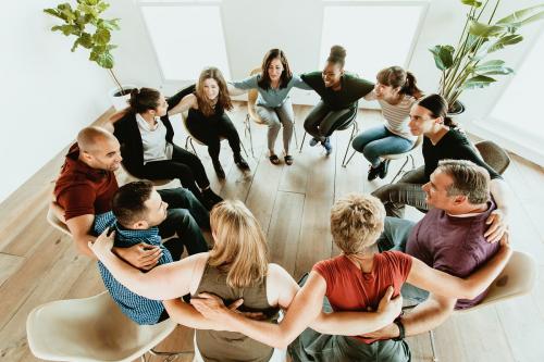 Diverse people in a support group session - 2194585