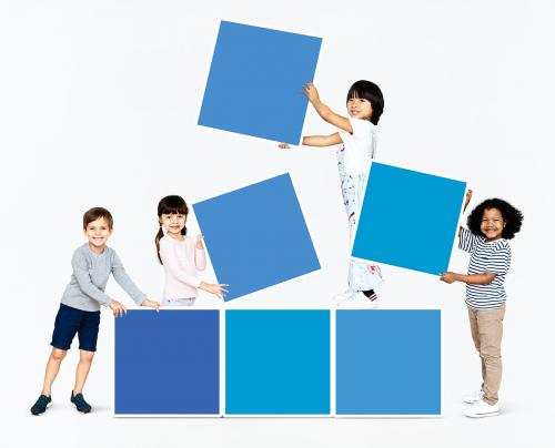 Diverse happy kids stacking empty square boards - 491960