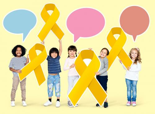 Kids holding gold ribbons supporting childhood cancer awareness - 492036