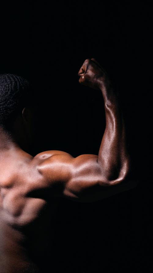 Rear view of muscular black man mobile phone wallpaper - 2025248