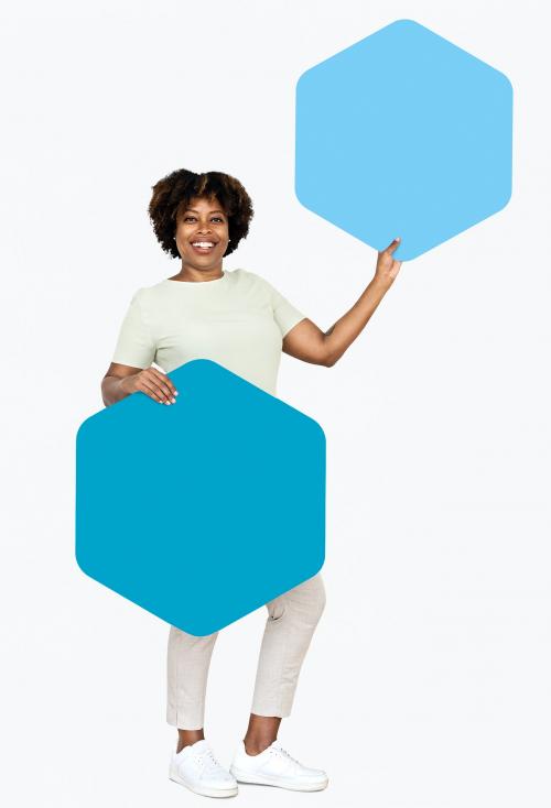 Cheerful woman showing blue hexagon shaped boards - 491109