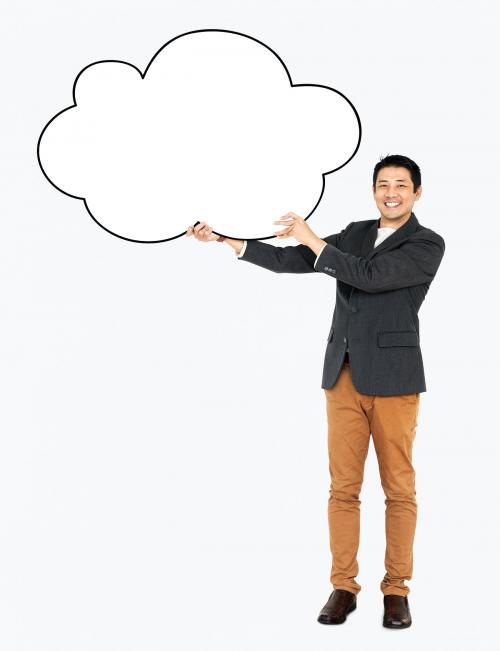 Cheerful man showing a blank cloud shaped board - 491127