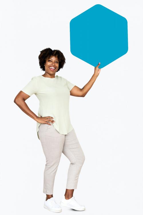 Cheerful woman showing a blank blue hexagon shaped board - 491150