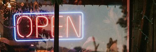 Neon open sign in the window of a restaurant - 2263120