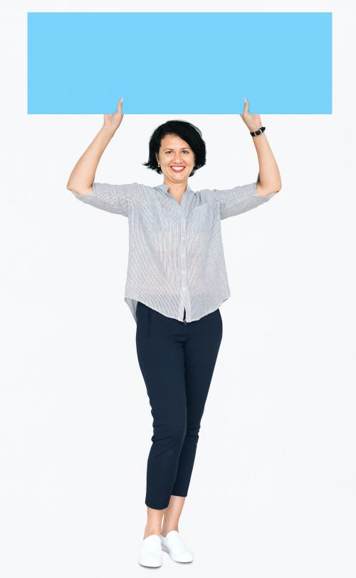 Cheerful woman showing a blank blue banner - 491194