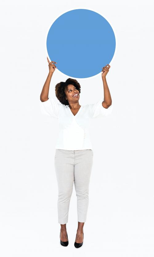 Cheerful businesswoman holding a blue round board - 491219
