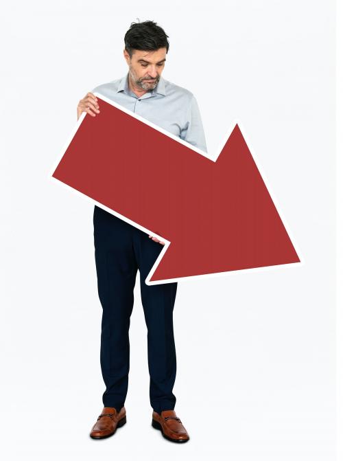 An unhappy businessman holding a red arrow - 491231