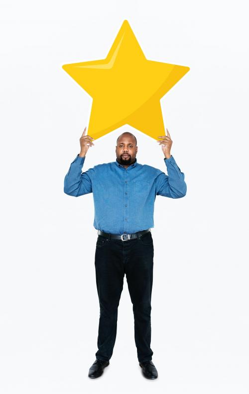 Businessman showing golden star rating symbol - 477775