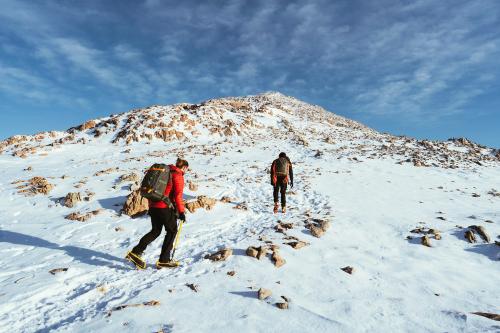 Mountaineers climbing the snowy mountain - 2097853