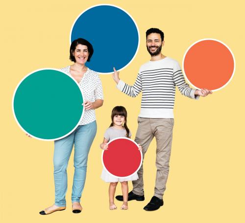 Happy family holding round colorful boards - 490334