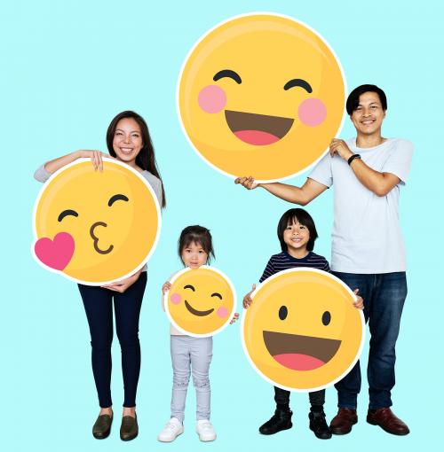 Happy family holding emoji icons - 490419