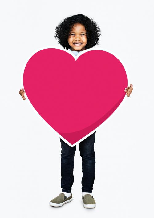 Happy kid holding a heart icon - 490750