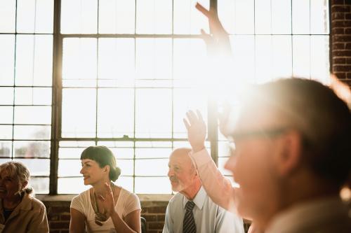 People raised their hand in a meeting - 1217965