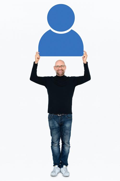 Happy man holding a blue user icon - 475604