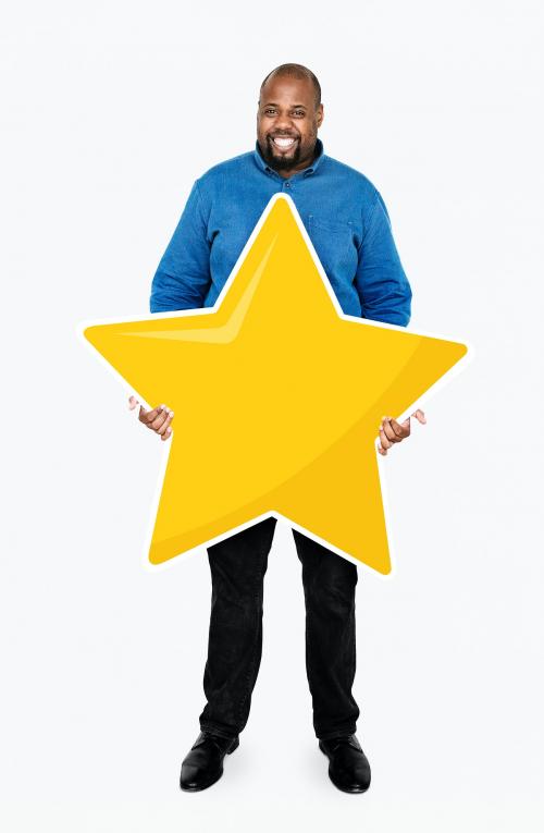 Businessman showing golden star rating symbol - 477245