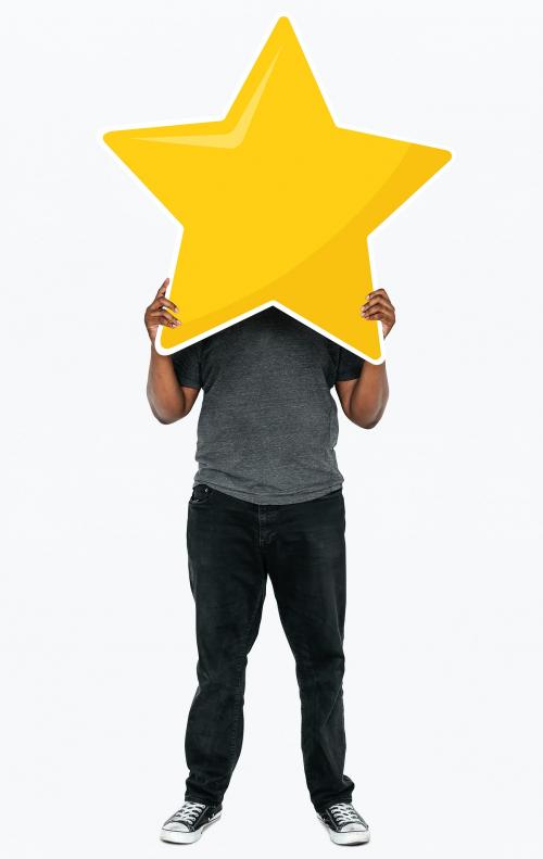 Cheerful man holding a golden star rating symbol - 477309