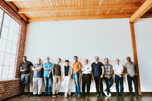 Cheerful diverse men standing in a row - 1223731