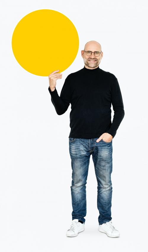 Happy man holding a round yellow board - 475128