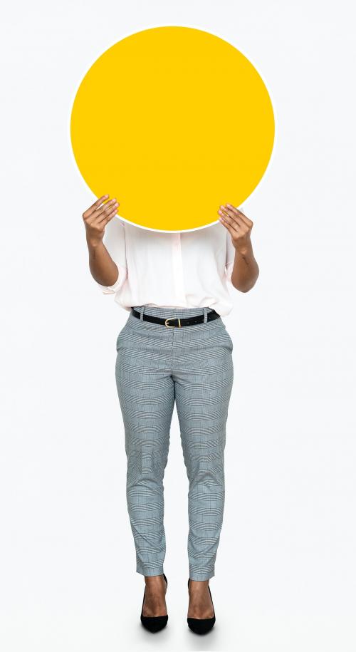 Woman holding a round yellow board - 475134