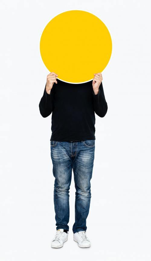 Man holding a round yellow board - 475177