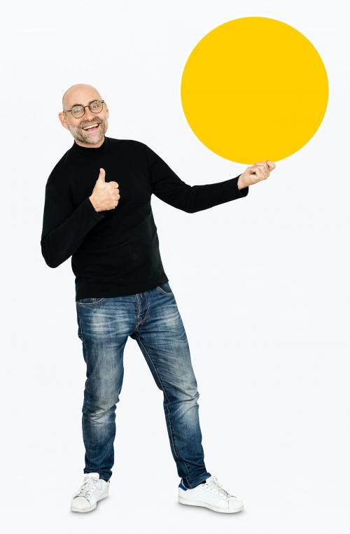 Happy man holding a yellow round board - 475189