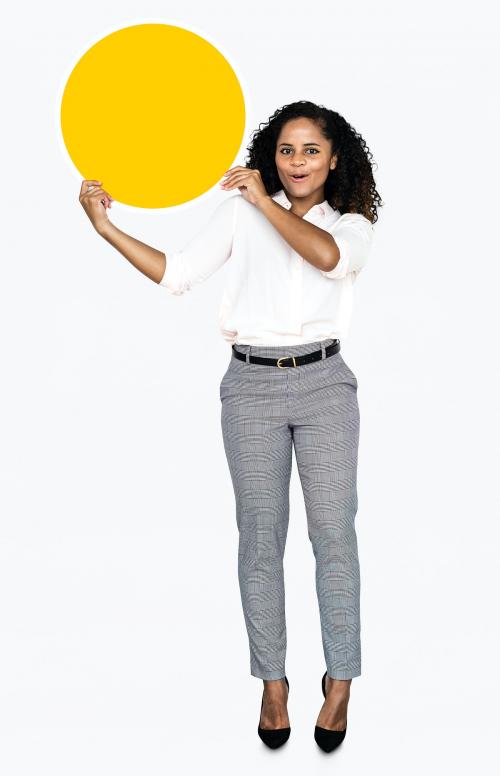 Cheerful woman holding a round yellow board - 475228