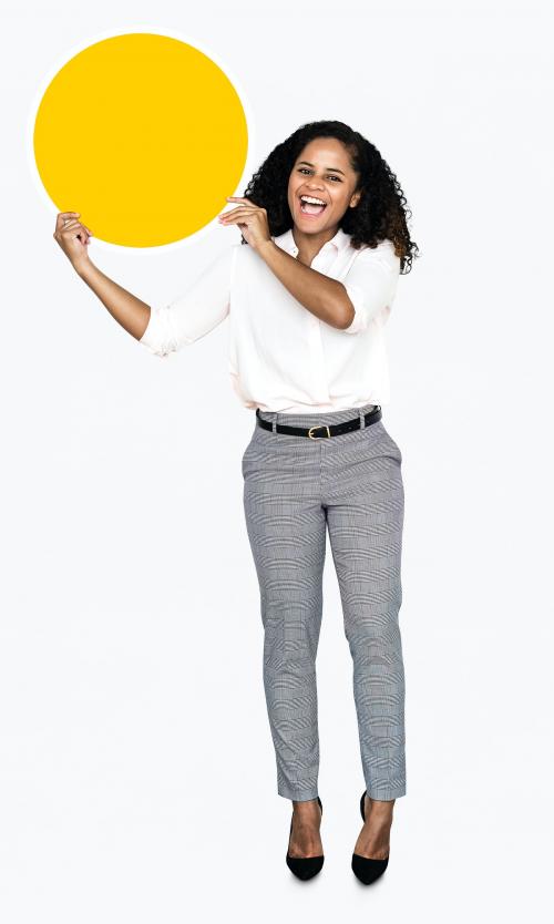 Cheerful woman holding a round yellow board - 475250