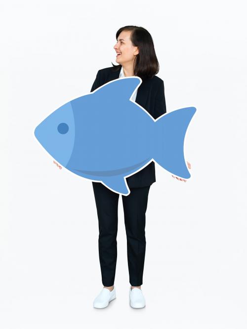 Woman holding a blue fish icon - 475304