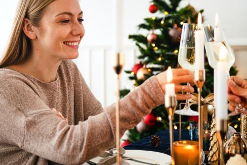 Blond woman having a romantic Christmas dinner - 1231724