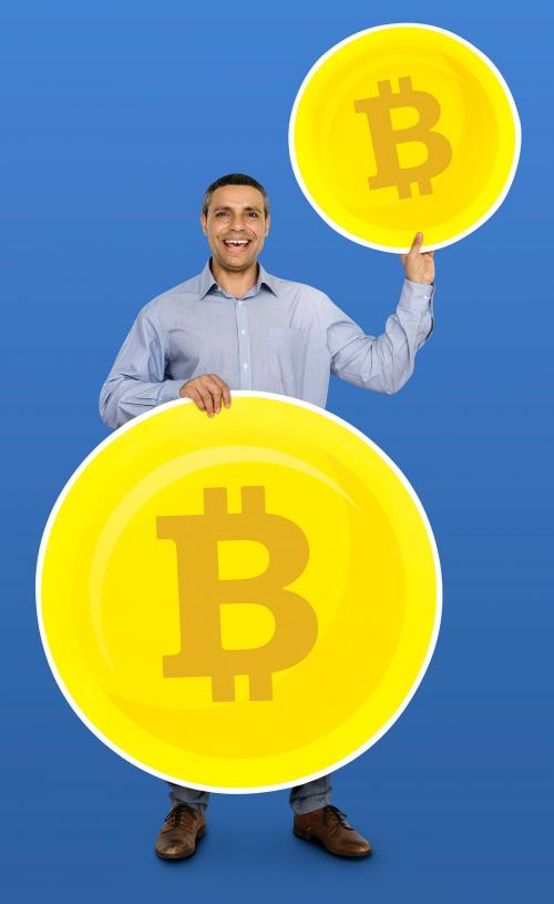 Happy businessman earning bitcoin currency - 470325