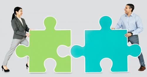 Business people connecting jigsaw puzzle pieces - 470378