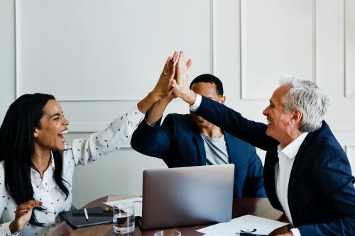 Successful business people doing a high five - 1216762