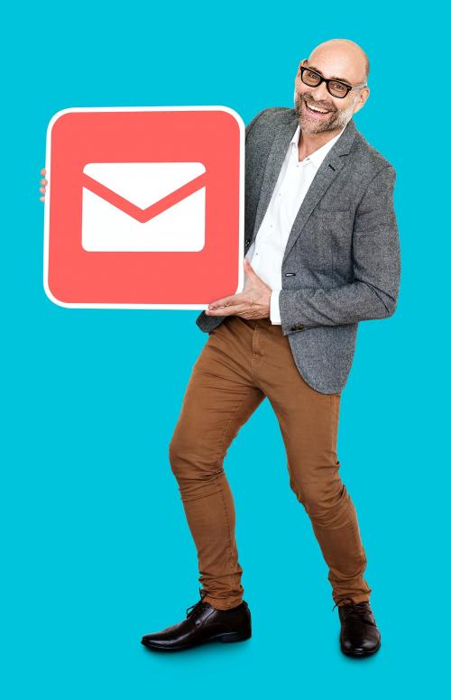 Mature man holding an email icon - 470461