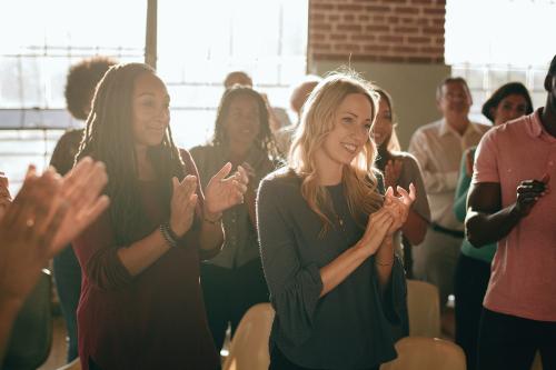 Diverse people clapping after a session - 1223743