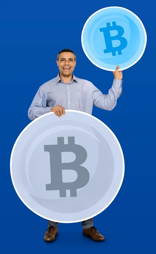 Happy businessman earning bitcoin currency - 470512