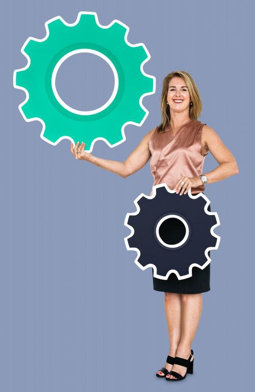 Female leader holding two gears - 470569