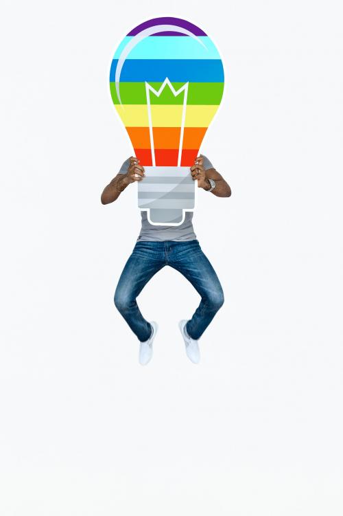 Man holding a colorful light bulb icon - 469323
