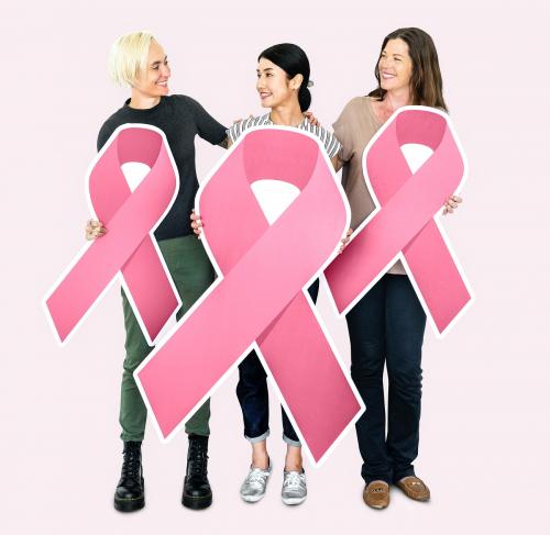 Women holding breast cancer ribbons - 469325