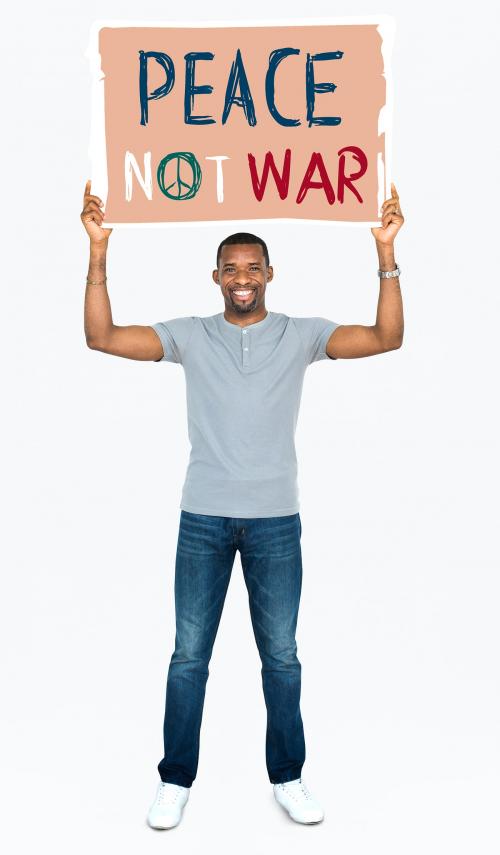 An African man holding peace not war signboard - 469624