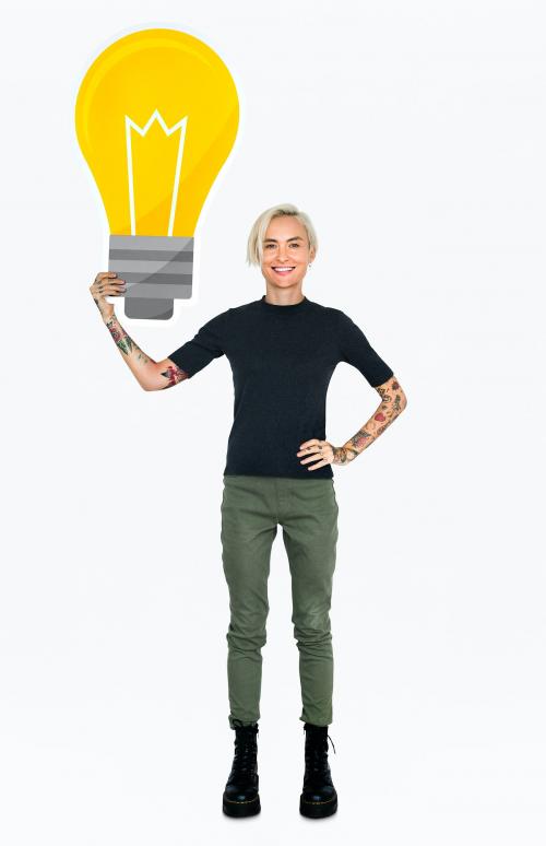 Happy woman holding a light bulb icon - 469628