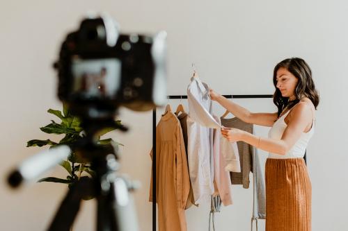 Fashion stylist working with clothes - 1225623