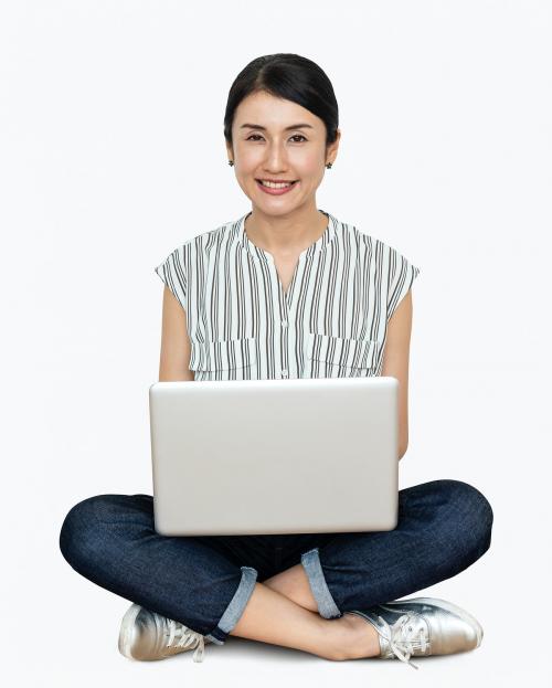 Happy woman using her laptop - 469694