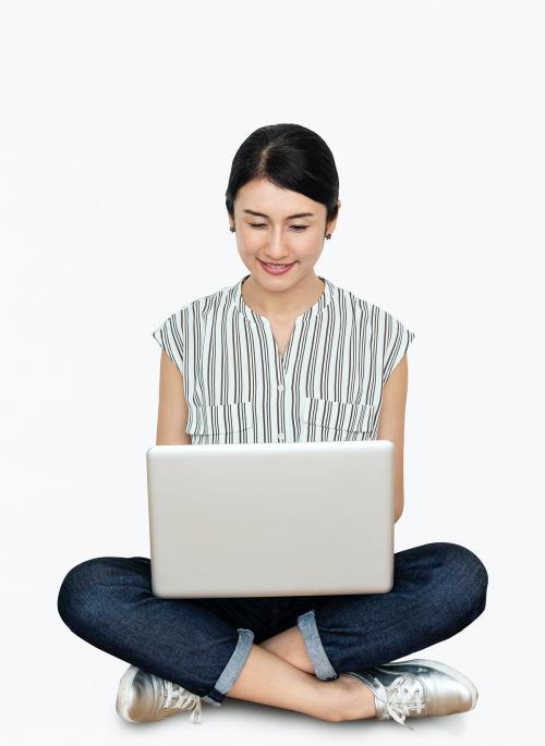 Happy woman using her laptop - 469834