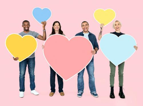 Diverse people holding heart shaped symbols - 470121
