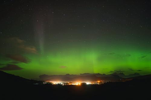 Aurora borealis over the Isle of Skye in Scotland - 1233438