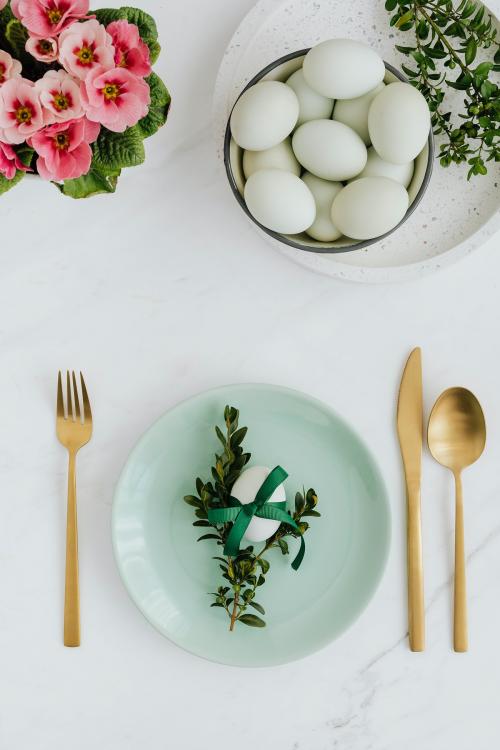 Aerial view of raw eggs on a white marble table - 937477