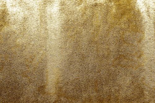 Roughly gold painted concrete wall surface background - 596871