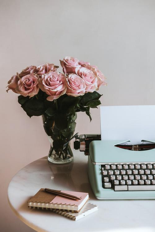 Retro mint typewriter by pink roses - 1221558