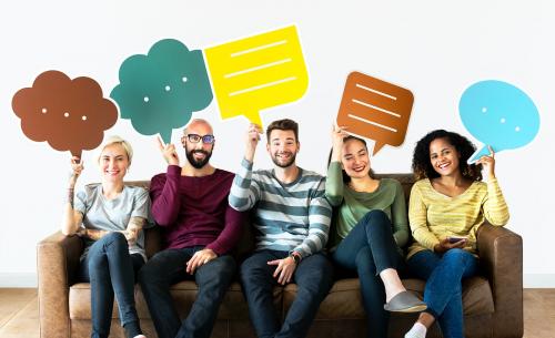 Cheerful people holding speech bubble icon - 414483