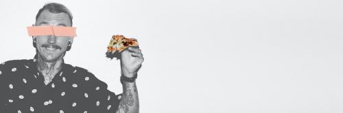 Tattooed man holding a pizza in his hand - 1225194